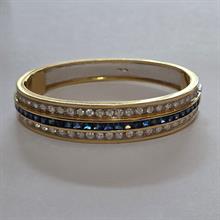 Lotto 31 - Importante bracciale in oro 18 carati, diamanti e 