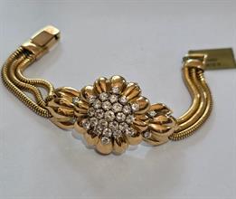 Lotto 4 - Importante bracciale-orologio in oro giallo e diam